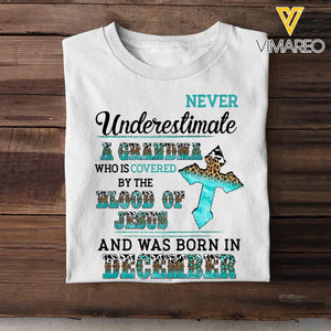 Personalized Never Underestimate A Grandma Who Is Covered By The Blood Of Jesus And Was Born In December Tshirt LDMVQ23409